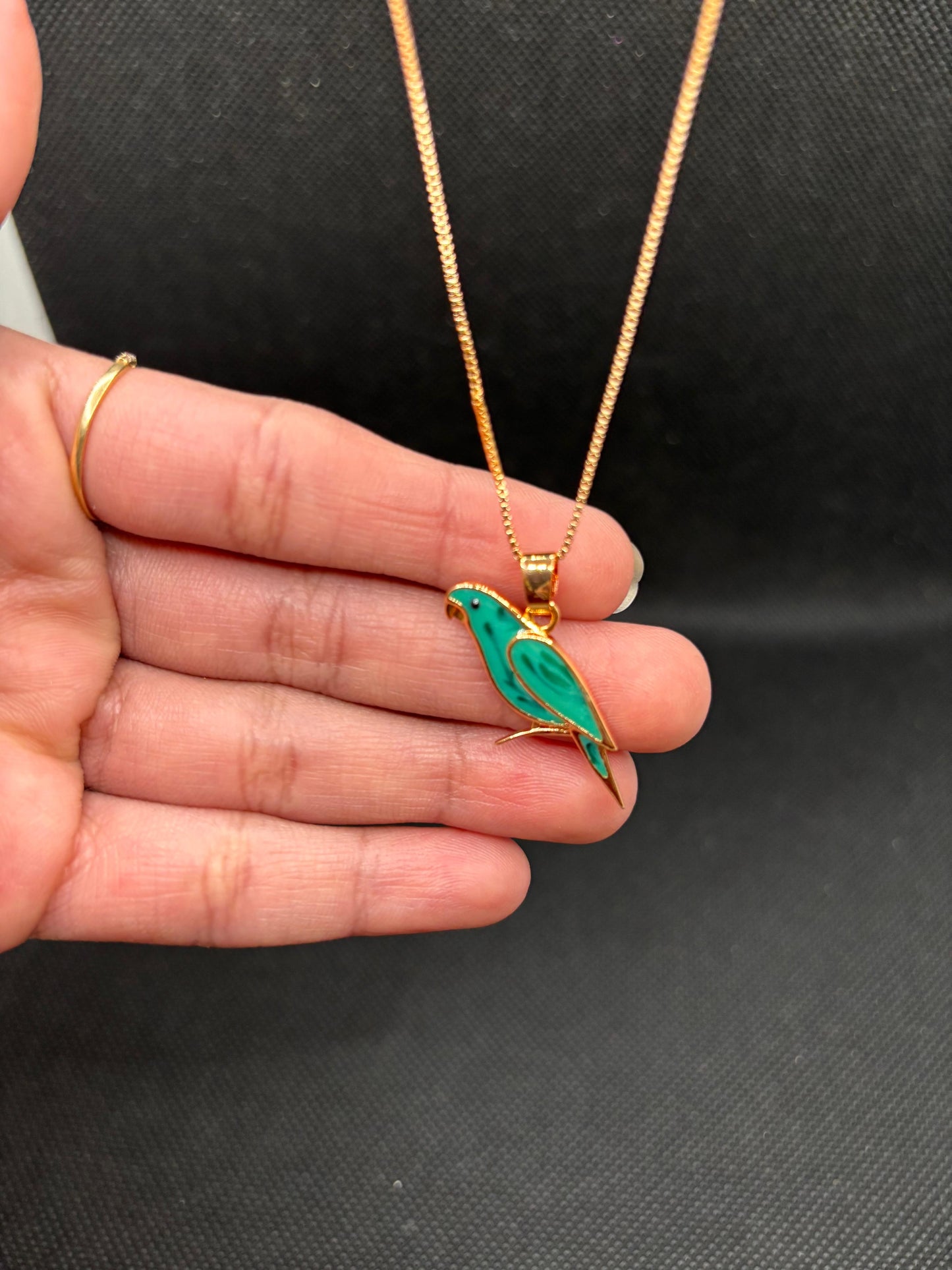 Emerald Songbird Pendant